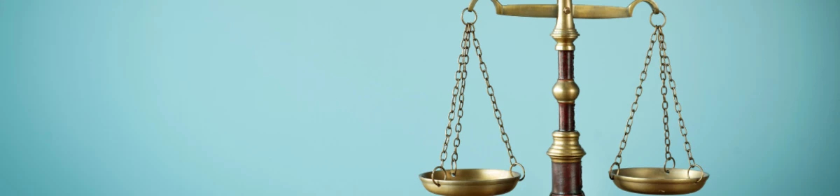 A photo of a set of bronze scales, representing the Office of the Ontario Ombudsman
