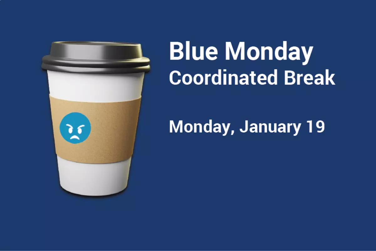 A coffee cup with a blue angry face emoji on it