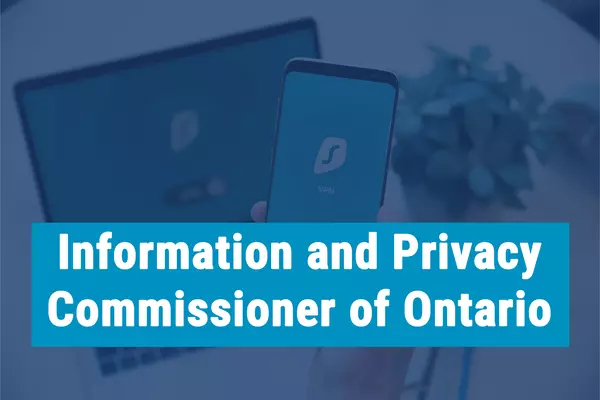 "Information and Privacy Commissioner of Ontario" on a photo of someone holding a phone in front of a laptop