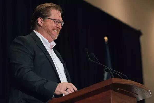 Dave Bulmer smiling at an AMAPCEO event