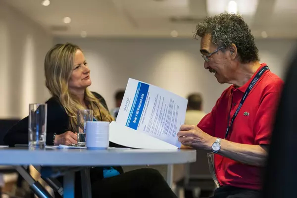 Two AMAPCEO Workplace Representatives talking