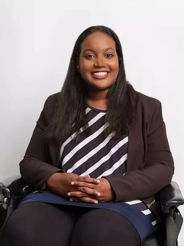 photo of Sara Jama sitting in a wheelchair