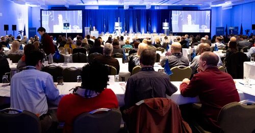 A crowd of AMAPCEO members at an Annual Delegates Conference