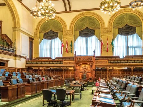 The interior of the Ontario Legislature. It is empty.