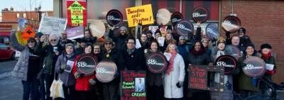 A group of labour leaders and Tim Hortons employees boycotting recent negative responses to raising the minimum wage.,