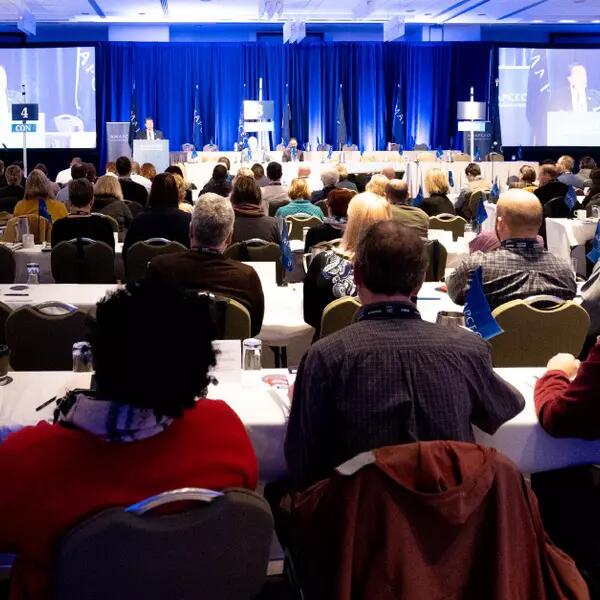 A crowd of AMAPCEO members at an Annual Delegates Conference
